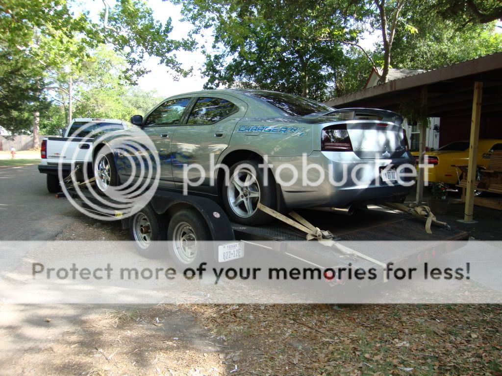Strapping CAr Down on Trailer